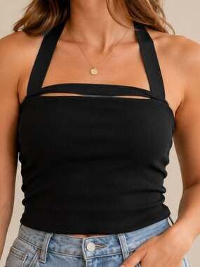 Elevate your athleisure style with this Sincerely Jules black ribbed crop top.